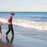 man walking on the beach